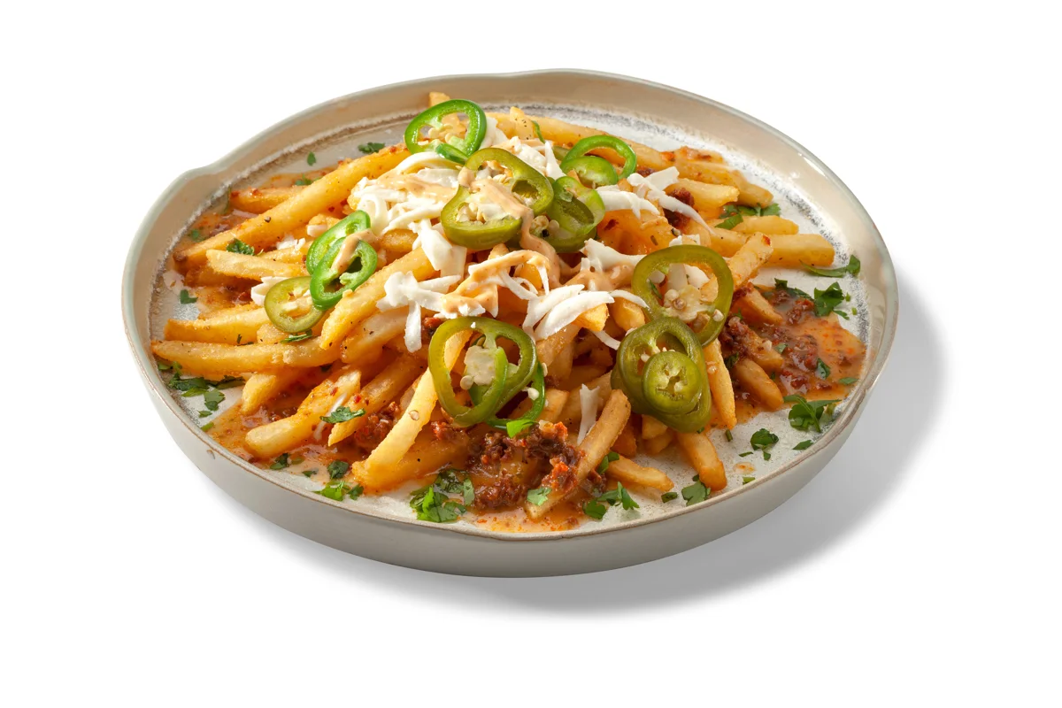 There’s so much flavor going on in these Chorizo and Queso Blanco Loaded Fries—chorizo crumbles, queso blanco crumbles, fresh jalapeños, chopped cilantro—that just a drizzle of Chipotle Ranch Dressing from Ken’s Foods is the perfect finish. 