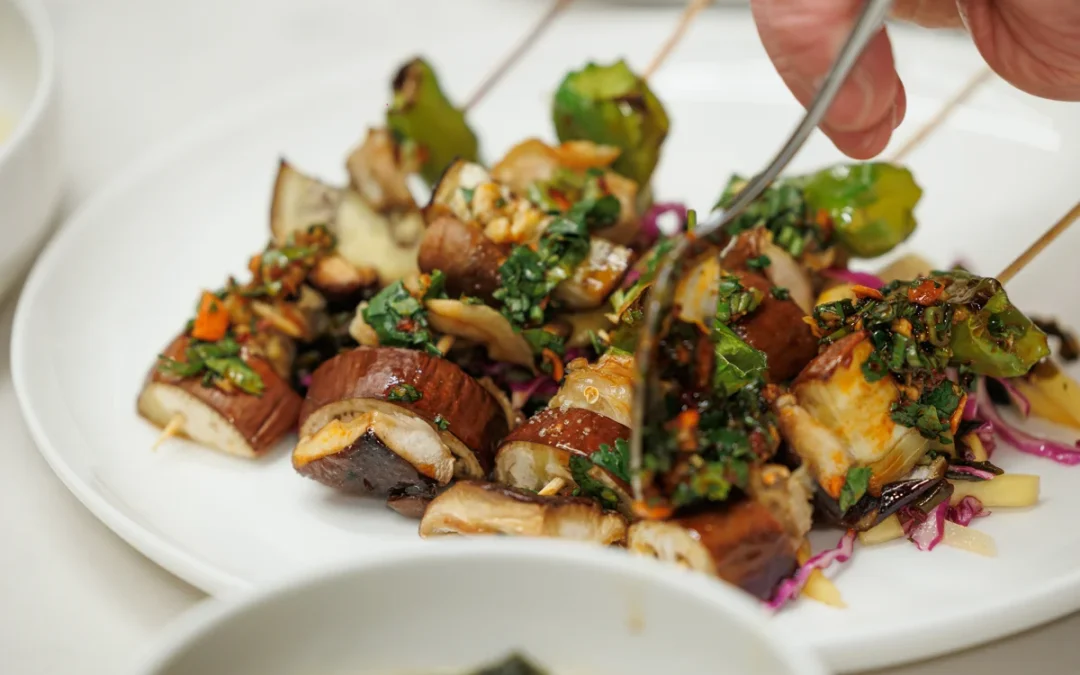 Charcoal-Grilled Clam and Shishito Skewers Restaurant Associates at Bloomberg | New York