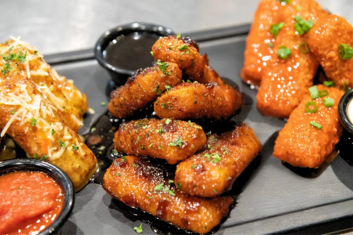 As part of its menu revamp, TGI Fridays took its bite-size mozzarella sticks into new territory with a trio of new flavors (Garlic Parmesan, Whiskey Glaze and Frank’s RedHot Buffalo) that can be sauced or served on the side as dips for a more customized experience.
