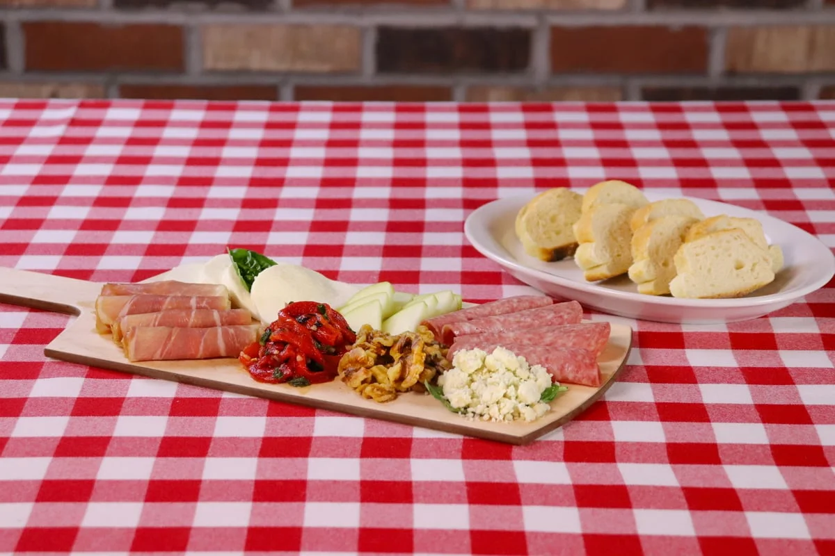 Grimaldi’s expands its communal offerings beyond deep-dish pizza with Bridge Boards. The meat-cheese-antipasti mixes change with the seasons, adding ongoing novelty.
