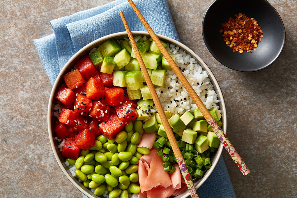 Enjoy this vegan version of a Hawaiian staple with edamame, cucumber, avocado, pickled ginger, scallion, sesame, and sticky rice.